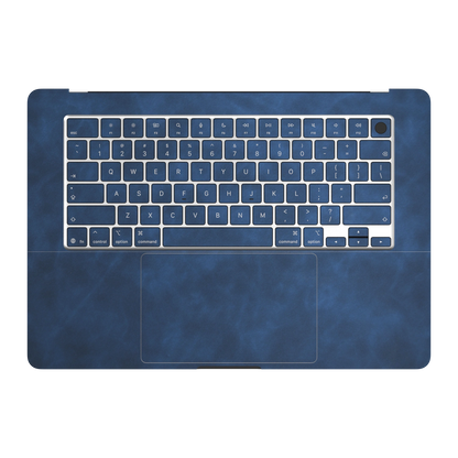 Dark Gray Blue scrub-textured synthetic leather MacBook skin. Inside (C) and matching keycap material illustration. Air 15.3 M3-M5 shared material/installation reference; exact cutouts and included pieces follow selected model and coverage. Laptop not included.
