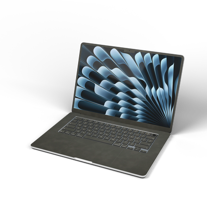 Dark Gray scrub-textured synthetic leather MacBook skin. Open front material illustration. Air 15.3 M3-M5 shared material/installation reference; exact cutouts and included pieces follow selected model and coverage. Laptop not included.
