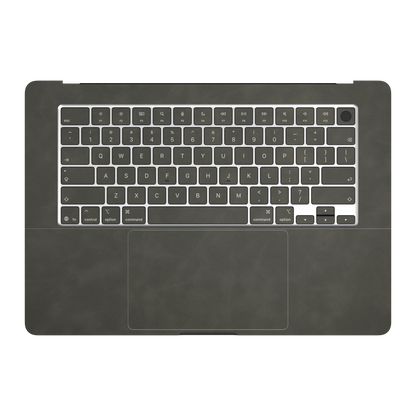 Dark Gray scrub-textured synthetic leather MacBook skin. Inside (C) and matching keycap material illustration. Air 15.3 M3-M5 shared material/installation reference; exact cutouts and included pieces follow selected model and coverage. Laptop not included.