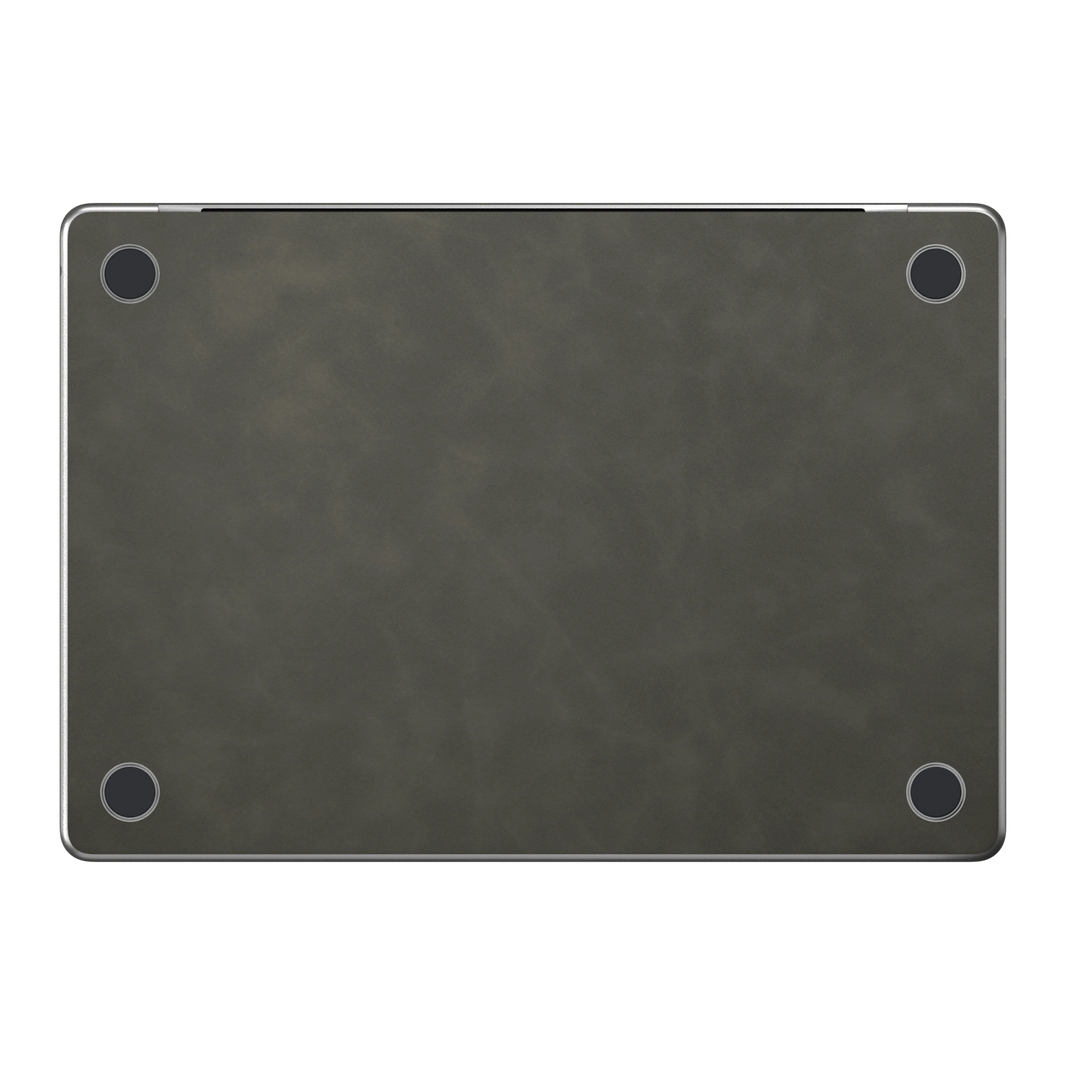 Dark Gray scrub-textured synthetic leather MacBook skin. Bottom (D) material illustration; included only with bottom coverage. Air 15.3 M3-M5 shared material/installation reference; exact cutouts and included pieces follow selected model and coverage. Laptop not included.