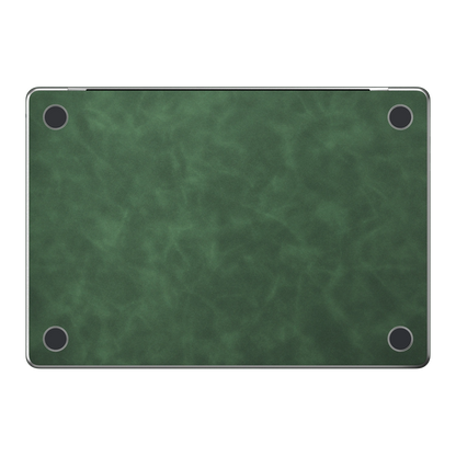 Green scrub-textured synthetic leather MacBook skin. Bottom (D) material illustration; included only with bottom coverage. Air 15.3 M3-M5 shared material/installation reference; exact cutouts and included pieces follow selected model and coverage. Laptop not included.