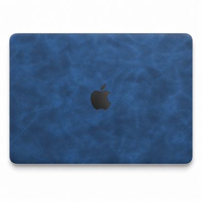 Dark Gray Blue scrub-textured synthetic leather MacBook top lid coverage illustration; cut layout varies by model.