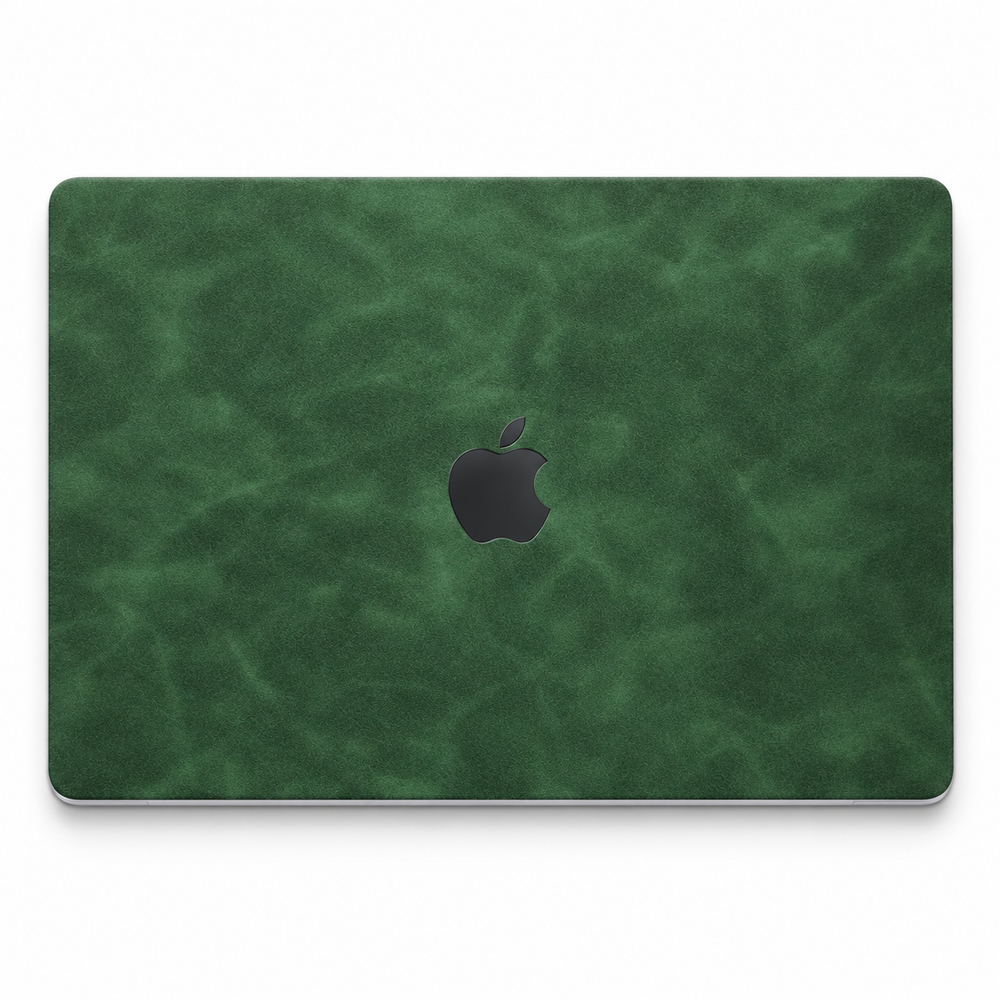 Green scrub-textured synthetic leather MacBook top lid coverage illustration; cut layout varies by model.
