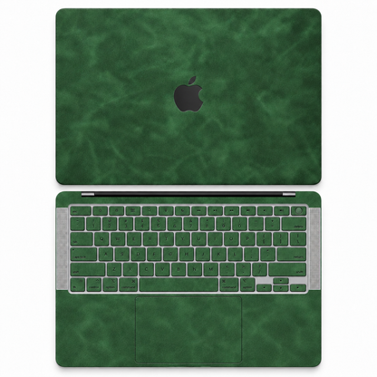 Green scrub-textured synthetic leather MacBook skin coverage illustration: top lid and inside, with matching keycap stickers.
