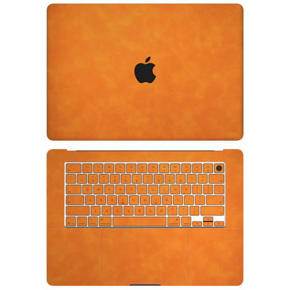 Orange scrub-textured synthetic leather MacBook skin. Top+Inside coverage: A and C with keycap stickers; no D bottom or B screen edge. Air 15.3 M3-M5 shared material/installation illustration; actual cutouts and included pieces follow the selected model and coverage. Laptop not included.