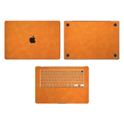 Orange scrub-textured synthetic leather MacBook skin. Top Inside & Bottom Wraps coverage: A, C and D; no B screen edge. Air 15.3 M3-M5 shared material/installation illustration; actual cutouts and included pieces follow the selected model and coverage. Laptop not included.