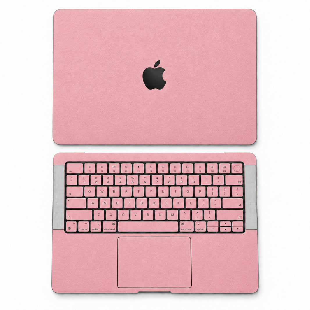 Pink synthetic leather MacBook skin illustration: lid and inside with keycaps.