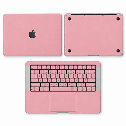 Pink synthetic leather MacBook skin illustration: lid, inside with keycaps and bottom.