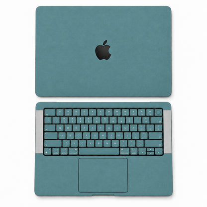 Teal synthetic leather MacBook skin illustration: lid and inside with keycaps.