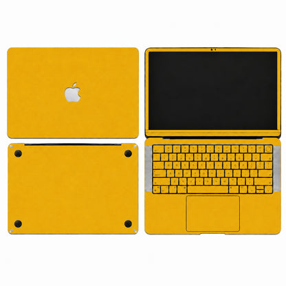Yellow synthetic leather MacBook skin illustration: lid, inside with keycaps, bottom and screen edge.