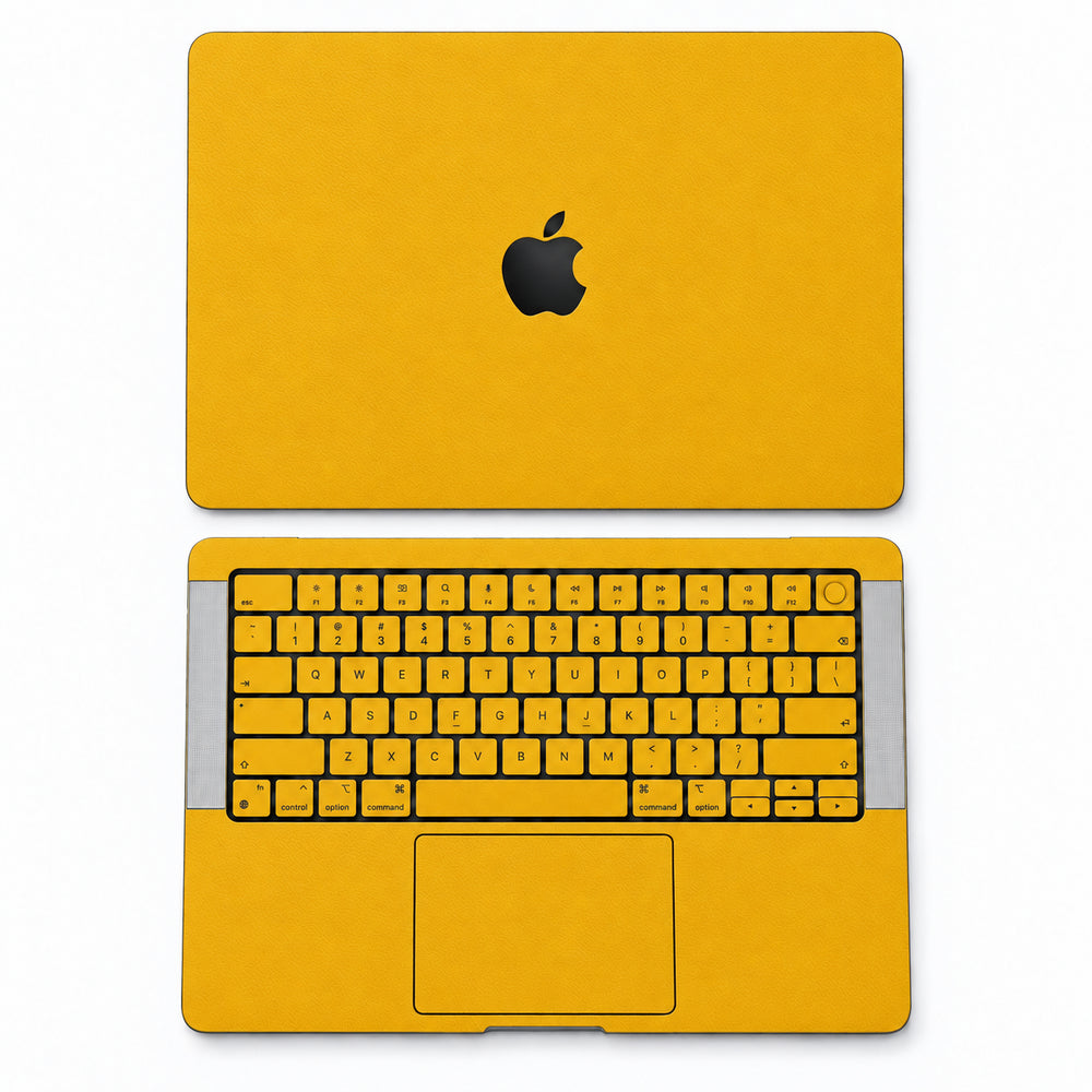Yellow synthetic leather MacBook skin illustration: lid and inside with keycaps.