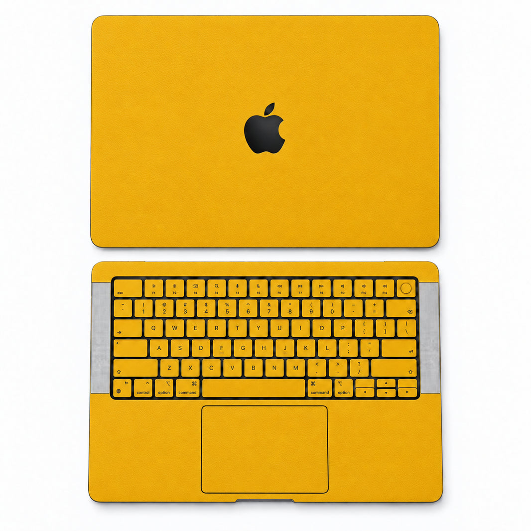 Yellow synthetic leather MacBook skin illustration: lid and inside with keycaps.