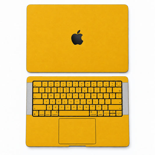 Yellow synthetic leather MacBook skin illustration: lid and inside with keycaps.